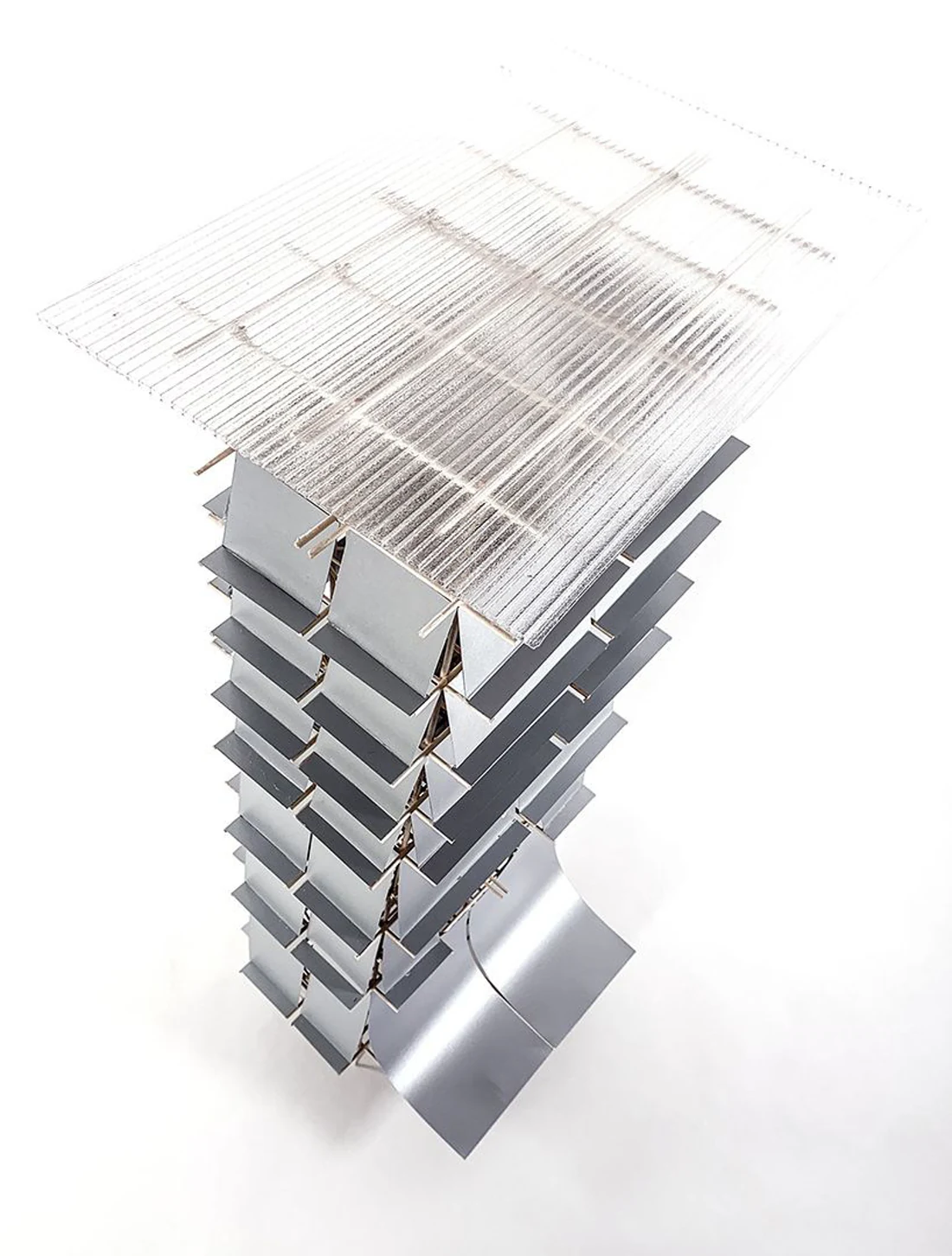 Top-down view of the model's canopy roof — a grid of cross-bracing covering the top of the tower